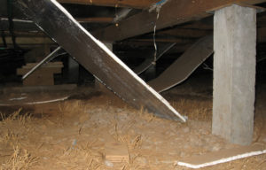 Rigid foam or boards of any kind are difficult to install because of the small size of the entrance point and the irregularity in joist spacing under floors.